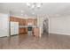 Spacious kitchen features wooden cabinets, tile flooring, and a breakfast bar area at 224 Morgyn Ln # 6, Boulder City, NV 89005
