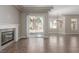 Open living space featuring fireplace and access to the backyard through a sliding glass door at 224 Morgyn Ln # 6, Boulder City, NV 89005