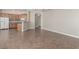 Open-concept living and kitchen area with tile floors at 224 Morgyn Ln # 6, Boulder City, NV 89005
