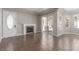Bright living room with fireplace, tiled floors, and sliding glass doors to the outdoor space at 224 Morgyn Ln # 6, Boulder City, NV 89005