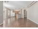 Open-concept living room features tile floors and seamlessly flows into the kitchen at 224 Morgyn Ln # 6, Boulder City, NV 89005