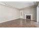 Spacious living room with fireplace and large sliding glass doors, showcasing natural light at 224 Morgyn Ln # 6, Boulder City, NV 89005