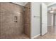Tiled shower with shower head and built-in shelf at 224 Morgyn Ln # 6, Boulder City, NV 89005