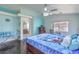Bright bedroom boasts scenic views and wood flooring at 261 Fairway Woods Dr, Las Vegas, NV 89148