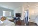Open living room with hardwood floors and ample natural light at 261 Fairway Woods Dr, Las Vegas, NV 89148
