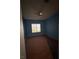 This cozy bedroom is filled with natural light from the large window at 2695 Olivia Heights Ave, Henderson, NV 89052