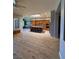 Open-concept kitchen with a large island, wood cabinets, and modern stainless steel appliances at 2695 Olivia Heights Ave, Henderson, NV 89052