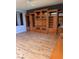 Living room features a built in wall unit with views of the kitchen and the lake at 2695 Olivia Heights Ave, Henderson, NV 89052