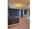 Large living room with wood floors and modern gray paint at 2695 Olivia Heights Ave, Henderson, NV 89052