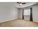 Bedroom with window and drapes, carpeted floor, and a ceiling fan at 2785 Carnation Ln # 0, Henderson, NV 89074
