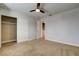 A carpeted bedroom offers a spacious closet and an adjoining bathroom, enhancing convenience at 2785 Carnation Ln # 0, Henderson, NV 89074