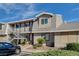 A two-story condo features gray siding, gray roof, and a metal staircase at 2785 Carnation Ln # 0, Henderson, NV 89074