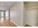 Spacious hallway with wood flooring, coat hooks, and open closet at 2785 Carnation Ln # 0, Henderson, NV 89074