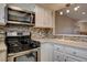 Updated kitchen featuring stainless steel appliances, modern countertops, and cabinetry at 2785 Carnation Ln # 0, Henderson, NV 89074