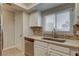 Bright kitchen with stainless steel dishwasher, undermount sink, and window view at 2785 Carnation Ln # 0, Henderson, NV 89074