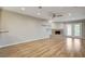 Bright living room with wood floors, fireplace, and white trim at 2785 Carnation Ln # 0, Henderson, NV 89074