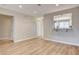 A spacious living room with wood floors and bright lighting at 2785 Carnation Ln # 0, Henderson, NV 89074