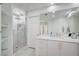 Bright bathroom features a glass shower, sleek vanity, and modern fixtures, creating a spa-like experience at 2851 Queens Courtyard Dr, Las Vegas, NV 89109