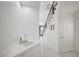 Bright hallway features a powder room and stairs leading up to a naturally lit landing at 2851 Queens Courtyard Dr, Las Vegas, NV 89109