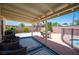 Outdoor patio area with an area rug and plenty of seating and a grill at 3484 Anthony Dr, Las Vegas, NV 89121