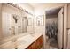 Bathroom with dual sinks, a large mirror, and a shower/tub combo at 3484 Anthony Dr, Las Vegas, NV 89121