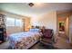 Bedroom with carpet, natural light, and decorated with floral decor at 3484 Anthony Dr, Las Vegas, NV 89121