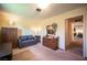 Bedroom showcasing a neutral color scheme and comfortable sofa bed at 3484 Anthony Dr, Las Vegas, NV 89121