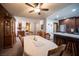 Inviting dining area open to the kitchen, featuring ample seating and a seamless flow to other living spaces at 3484 Anthony Dr, Las Vegas, NV 89121