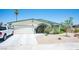 Charming single-story home featuring a two-car garage and well-maintained front yard with desert landscaping at 3484 Anthony Dr, Las Vegas, NV 89121
