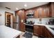 This updated kitchen showcases stainless steel appliances and beautiful wood cabinetry at 3484 Anthony Dr, Las Vegas, NV 89121