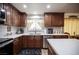 The updated kitchen features stainless steel appliances, countertops, and wood cabinets at 3484 Anthony Dr, Las Vegas, NV 89121