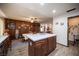 The kitchen island offers ample space for food prep and additional storage with seamless flow into the dining area at 3484 Anthony Dr, Las Vegas, NV 89121