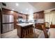 Well-appointed kitchen with an island, modern stainless steel appliances, and ample cabinet space at 3484 Anthony Dr, Las Vegas, NV 89121