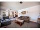 Spacious living room with ample seating arrangements, providing the perfect space for relaxation and conversation at 3484 Anthony Dr, Las Vegas, NV 89121