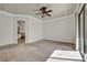 Spacious bedroom with access to an en-suite bathroom and a sliding glass door at 37 Stonemark Dr, Henderson, NV 89052