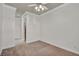 Bedroom with a ceiling fan, crown molding, and carpet at 37 Stonemark Dr, Henderson, NV 89052