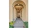 Inviting front porch with decorative arch and a stylish front door at 37 Stonemark Dr, Henderson, NV 89052