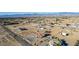 Expansive aerial view of a desert community with scattered homes and mountain views in the distance at 3821 Tumbleweed Ave, Pahrump, NV 89048