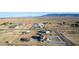 Stunning aerial view captures houses spread across a desert terrain, set against distant mountains at 3821 Tumbleweed Ave, Pahrump, NV 89048