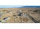 Panoramic aerial image displaying a desert community, showcasing various residences and mountain scenery at 3821 Tumbleweed Ave, Pahrump, NV 89048