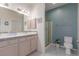 Bathroom with double sinks, shower and toilet at 3821 Tumbleweed Ave, Pahrump, NV 89048