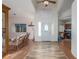 Bright entryway features wood-look floors, high ceilings and decorative front door at 3821 Tumbleweed Ave, Pahrump, NV 89048