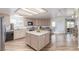 Spacious kitchen with center island, stainless steel appliances, and plenty of cabinet space at 3821 Tumbleweed Ave, Pahrump, NV 89048