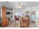 Bright living room featuring built-in shelves, a fireplace, and multiple seating areas at 3821 Tumbleweed Ave, Pahrump, NV 89048