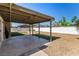 Backyard featuring covered patio, gravel landscaping, and minimalist yard at 3826 Edmond St, Las Vegas, NV 89103