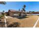 Charming backyard featuring desert landscaping, a covered patio, and a well-maintained exterior at 3826 Edmond St, Las Vegas, NV 89103