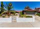Charming single-story home featuring well-maintained landscaping, driveway, and a red tiled roof at 3826 Edmond St, Las Vegas, NV 89103