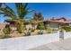 Inviting single-story home with beautiful desert landscaping and a well-manicured front yard at 3826 Edmond St, Las Vegas, NV 89103