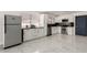 A kitchen with stainless steel appliances, and white cabinets at 3826 Edmond St, Las Vegas, NV 89103