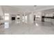 Bright and spacious living area with marble floors, fireplace, and open layout at 3826 Edmond St, Las Vegas, NV 89103